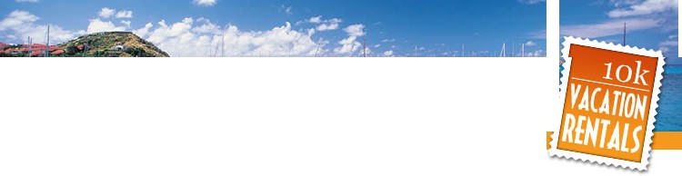 Sailboats in a harbor, with the 10k Vacation Rentals stamp logo